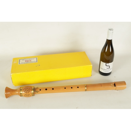 79 - A FLAUTO DOLCE MOECK BAROQUE RECORDER made in maple with brass collars in the original box(64.5cm ov... 