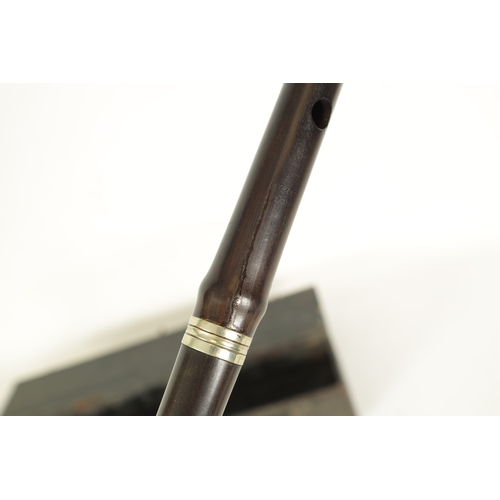 8 - A COLLECTION OF 19TH/20TH CENTURY ROSEWOOD FLUTES Comprising a piccolo, two flutes and a tabor pipe ... 