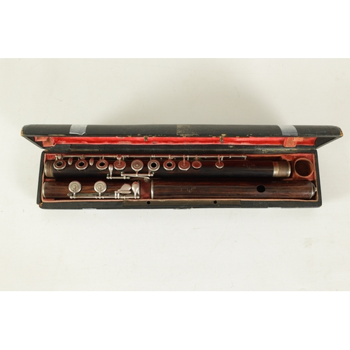 86 - A FINE CASED FRENCH FLUTE BY CLAIR GODFROY, A PARIS made in three sections with silver metal keys an... 