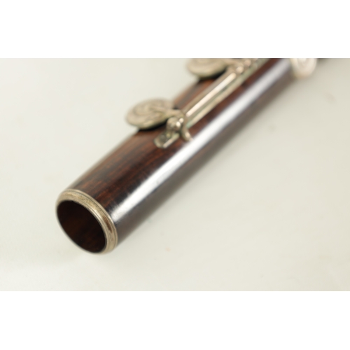 86 - A FINE CASED FRENCH FLUTE BY CLAIR GODFROY, A PARIS made in three sections with silver metal keys an... 