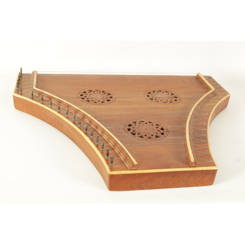 87 - A 20TH CENTURY HARDWOOD DULCIMER BY PETER ECKER DATED 1970 of shaped form with pierced sound frets, ... 