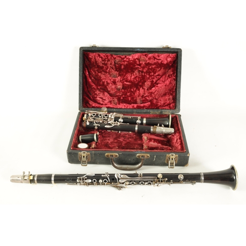 89 - A CASED PAIR OF BUFFET CRAMPON CLARINETS turned in ebony or grenadilla wood with impressed makers ma... 