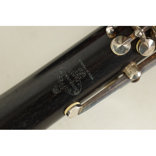 89 - A CASED PAIR OF BUFFET CRAMPON CLARINETS turned in ebony or grenadilla wood with impressed makers ma... 