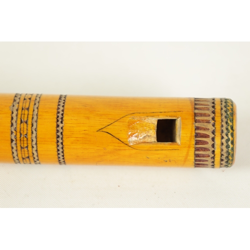 9 - A LATE 20TH CENTURY GREEK BAMBOO FLUTE having 8 finger holes, bands of engraved decoration, flowerhe... 