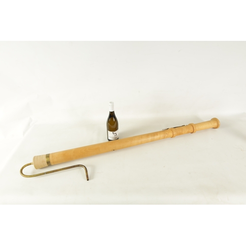 91 - A LARGE C-BASS RECORDER BY JOHN COUSEN Turned in maple with brass keys and mouthpiece, impressed mak... 