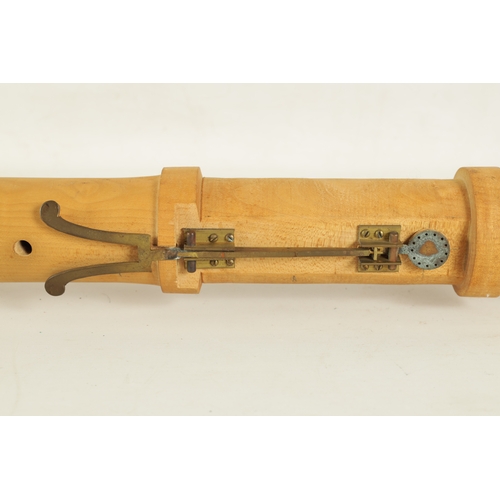 91 - A LARGE C-BASS RECORDER BY JOHN COUSEN Turned in maple with brass keys and mouthpiece, impressed mak... 