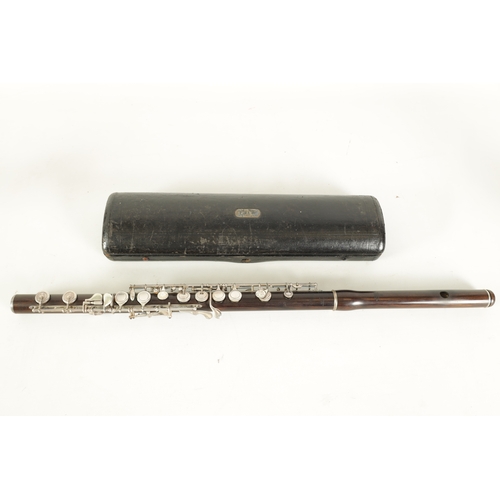 95 - A FINE CASED FLUTE BY RUDALL, CARTE & CO. LONDON in Boehm-carte system, the three piece flute turned... 