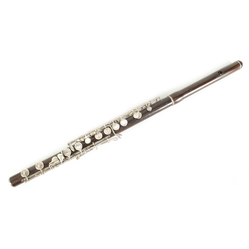 95 - A FINE CASED FLUTE BY RUDALL, CARTE & CO. LONDON in Boehm-carte system, the three piece flute turned... 