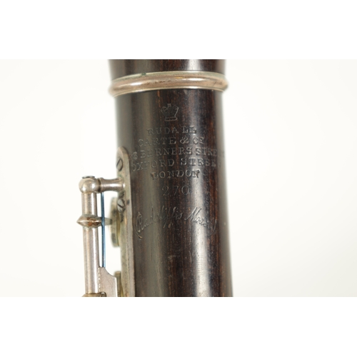 95 - A FINE CASED FLUTE BY RUDALL, CARTE & CO. LONDON in Boehm-carte system, the three piece flute turned... 