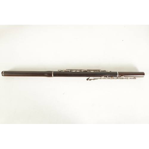 95 - A FINE CASED FLUTE BY RUDALL, CARTE & CO. LONDON in Boehm-carte system, the three piece flute turned... 