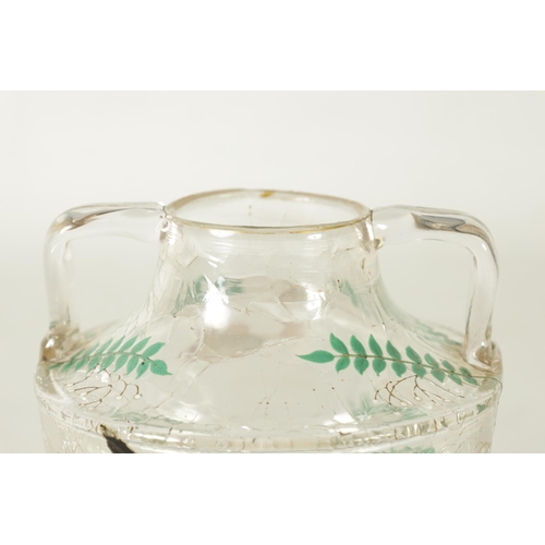 1 - AN EARLY 20TH CLEAR CRACKLEWARE TWO-HANDLED GLASS VASE with coloured enamel fish and fern spray deco... 