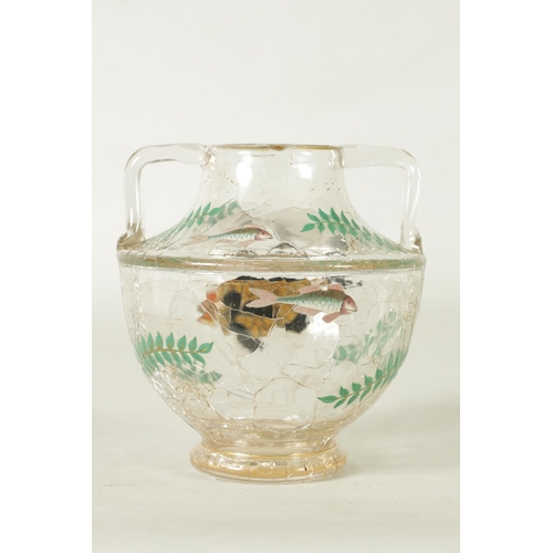 1 - AN EARLY 20TH CLEAR CRACKLEWARE TWO-HANDLED GLASS VASE with coloured enamel fish and fern spray deco... 