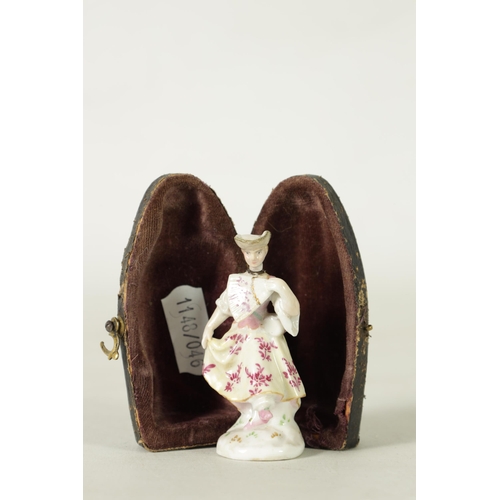 102 - AN 18TH CENTURY MEISSEN PURFUME BOTTLE AND STOPPER IN FITTED LEATHER CASE modelled as a standing cla... 