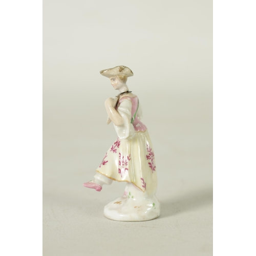102 - AN 18TH CENTURY MEISSEN PURFUME BOTTLE AND STOPPER IN FITTED LEATHER CASE modelled as a standing cla... 