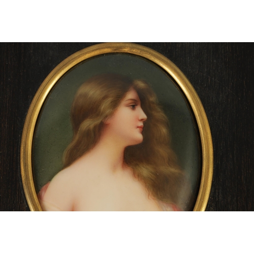 104 - A LATE 19TH CENTURY VIENNA OVAL MINIATURE CONVEX PORCELAIN PANEL depicting a side view of a semi-nud... 