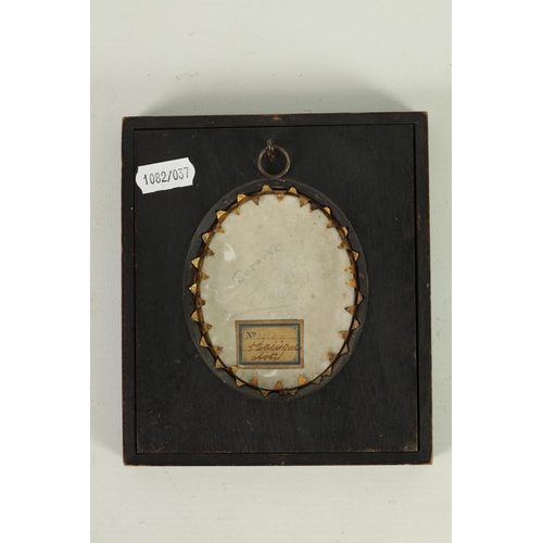 104 - A LATE 19TH CENTURY VIENNA OVAL MINIATURE CONVEX PORCELAIN PANEL depicting a side view of a semi-nud... 