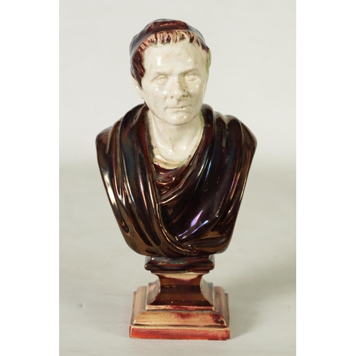 106 - A 19TH CENTURY PEARLWARE AND LUSTROUS GLAZED BUST SCULPTURED FIGURE OF CEASAR on a stepped square pl... 
