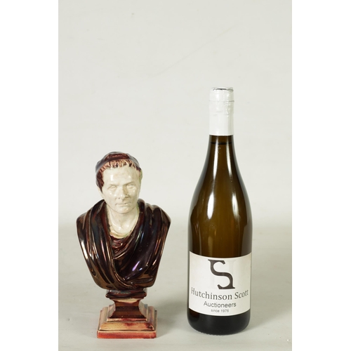 106 - A 19TH CENTURY PEARLWARE AND LUSTROUS GLAZED BUST SCULPTURED FIGURE OF CEASAR on a stepped square pl... 