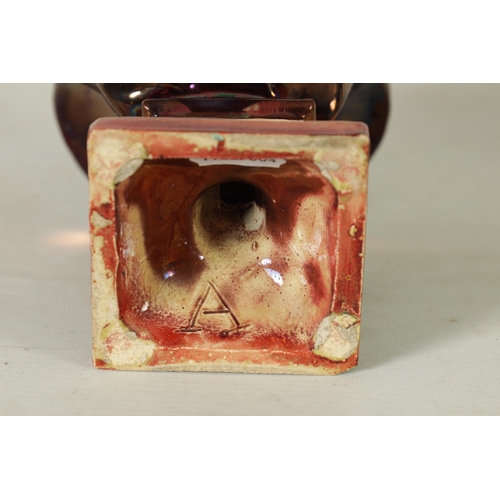 106 - A 19TH CENTURY PEARLWARE AND LUSTROUS GLAZED BUST SCULPTURED FIGURE OF CEASAR on a stepped square pl... 