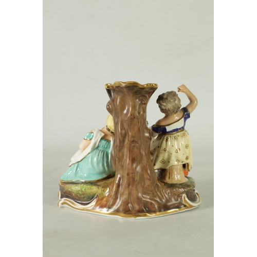 107 - AN EARLY 19TH CENTURY MINTON FIGURE GROUP DEPICTING CHILDREN FEEDING PETS on a gilt edge scrolled ba... 
