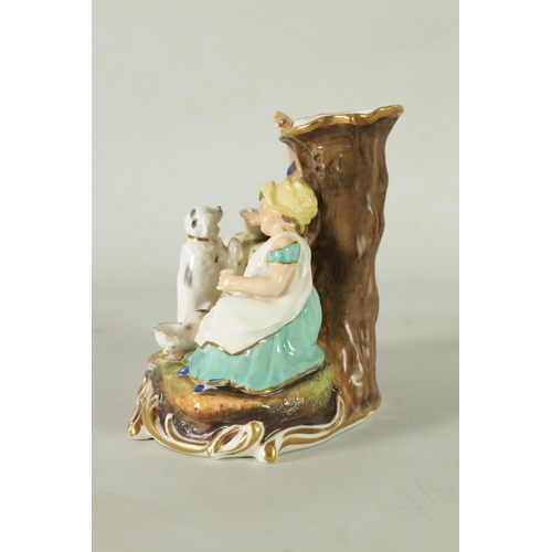 107 - AN EARLY 19TH CENTURY MINTON FIGURE GROUP DEPICTING CHILDREN FEEDING PETS on a gilt edge scrolled ba... 