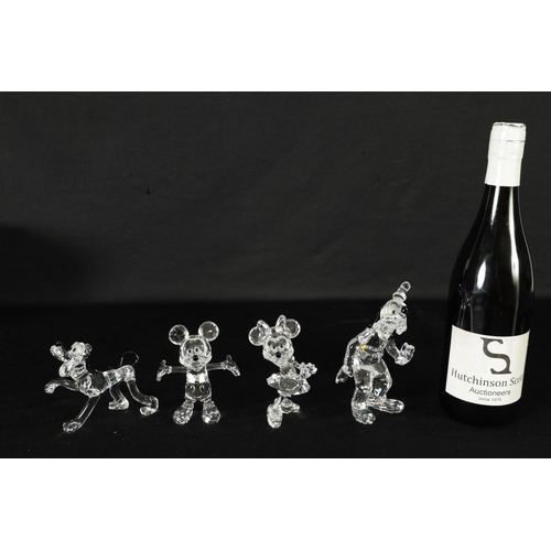 11 - A 20TH CENTURY MICKEY MOUSE COLLECTION OF SWAROVSKI CRYSTAL comprising Mickey Mouse, Minie Mouse, Go... 
