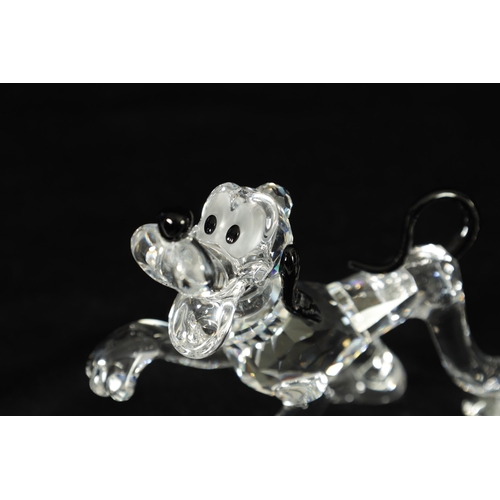 11 - A 20TH CENTURY MICKEY MOUSE COLLECTION OF SWAROVSKI CRYSTAL comprising Mickey Mouse, Minie Mouse, Go... 