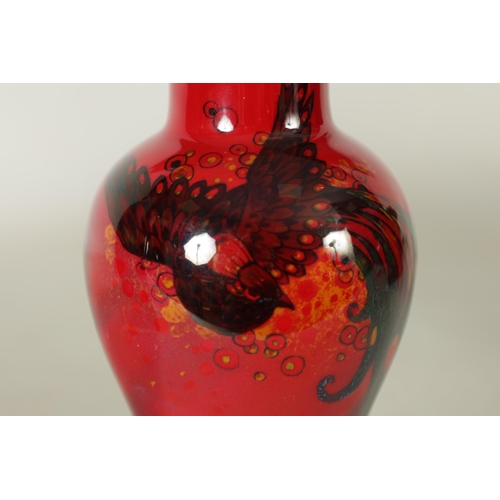 111 - TWO PIECED OF ROYAL DOULTON FLAMBE WARE GLAZED POTTERY AFTER NOKE comprising a shallow scalloped edg... 