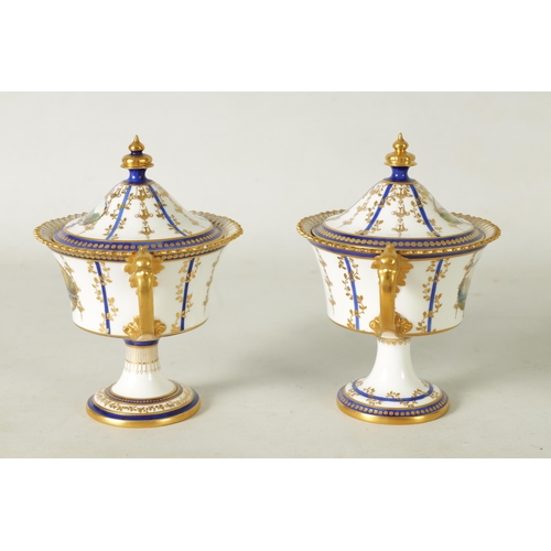 114 - A FINE PAIR OF ROYAL CROWN DERBY CAMPANA SHAPED TWO-HANDLED PEDESTAL VASES AND COVERS with richly gi... 