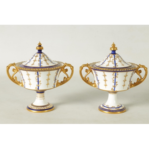 114 - A FINE PAIR OF ROYAL CROWN DERBY CAMPANA SHAPED TWO-HANDLED PEDESTAL VASES AND COVERS with richly gi... 