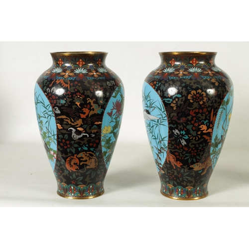 117 - A PAIR OF JAPANESE MEIJI PERIOD LARGE OVOID CLOISONNE VASES decorated bird in flowering landscape bl... 