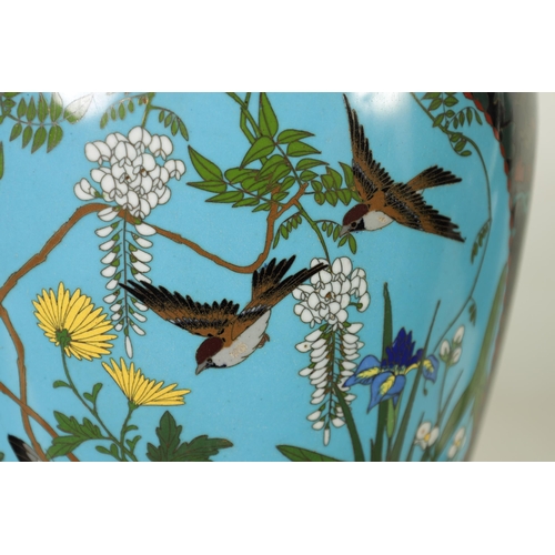 117 - A PAIR OF JAPANESE MEIJI PERIOD LARGE OVOID CLOISONNE VASES decorated bird in flowering landscape bl... 