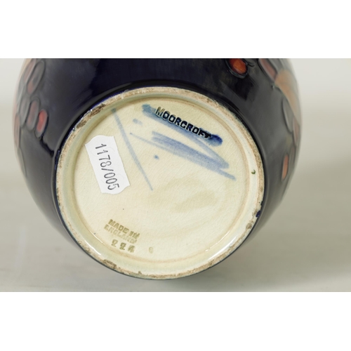 118 - A 1930's/40's WILLIAM MOORCROFT OVOID BISCUIT JAR with hammered pewter mount and domed lid, tube lin... 