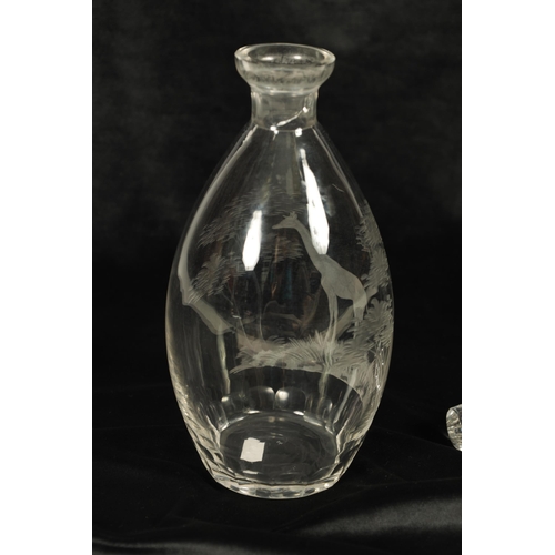 12 - A ROWLAND WARD SPIRIT DECANTER AND FACETTED STOPPER the ovoid body engraved with a giraffe in a tree... 