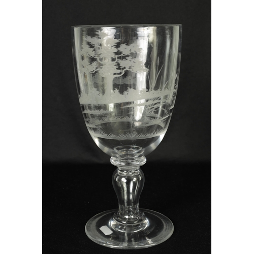 13 - A MID 19TH CENTURY GLASS GOBLET the inverted bell-shaped bowl with frosted cut engraved scene of an ... 