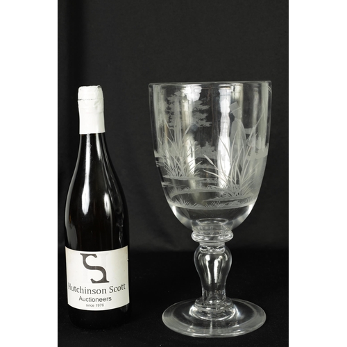 13 - A MID 19TH CENTURY GLASS GOBLET the inverted bell-shaped bowl with frosted cut engraved scene of an ... 