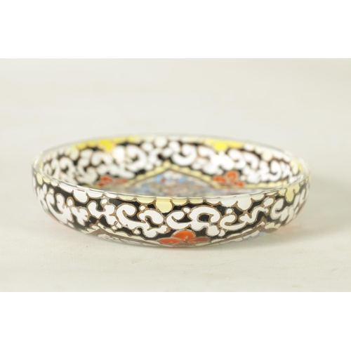15 - A LATE 19TH CENTURY CONTINENTAL ENAMELLED SHALLOW GLASS DISH colourfully decorated with aquatic bird... 