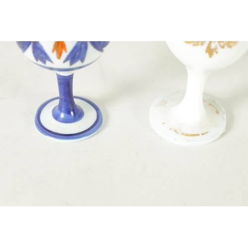 16 - A 19TH-CENTURY FRENCH OPALINE GLASS PEDESTAL VASE the ovoid body and tapering neck with jewelled flo... 