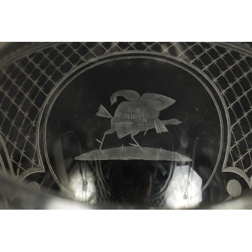 17 - AN OVERSIZED LATE GEORGIAN GLASS GOBLET the rounded bowl with frosted and cut engraved panels of coc... 