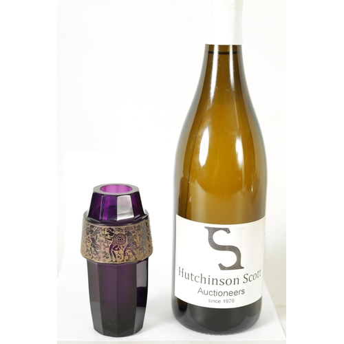 28 - AN EARLY 20TH-CENTURY PURPLE GLASS VIENNA SECESSIONIST VASE IN THE MOSER STYLE of facetted shaped fo... 