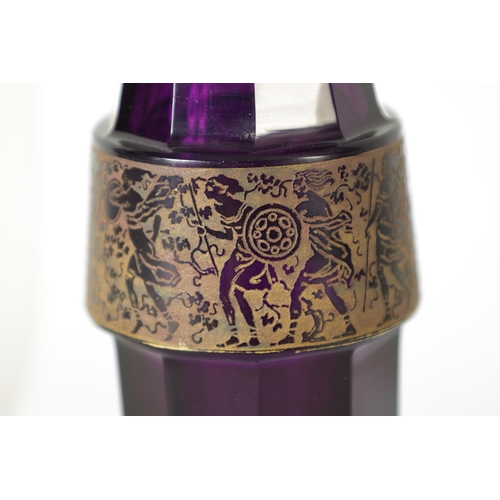 28 - AN EARLY 20TH-CENTURY PURPLE GLASS VIENNA SECESSIONIST VASE IN THE MOSER STYLE of facetted shaped fo... 