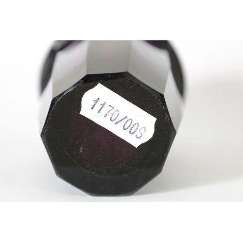 28 - AN EARLY 20TH-CENTURY PURPLE GLASS VIENNA SECESSIONIST VASE IN THE MOSER STYLE of facetted shaped fo... 