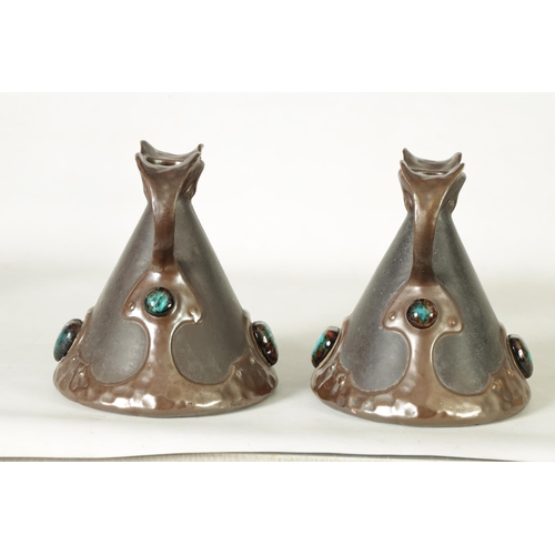 32 - A PAIR OF BRETBY ARTS AND CRAFTS SIMULATED COPPER WARE TWO HANDLED VASES with pinned raised lustrous... 