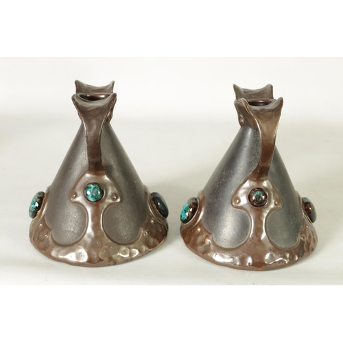 32 - A PAIR OF BRETBY ARTS AND CRAFTS SIMULATED COPPER WARE TWO HANDLED VASES with pinned raised lustrous... 