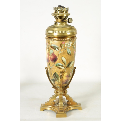 33 - A 19TH CENTURY CERAMIC AND CAST BRASS OIL LAMP with a detachable vessel and double burner, the conca... 