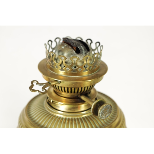 33 - A 19TH CENTURY CERAMIC AND CAST BRASS OIL LAMP with a detachable vessel and double burner, the conca... 