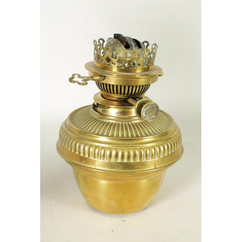 33 - A 19TH CENTURY CERAMIC AND CAST BRASS OIL LAMP with a detachable vessel and double burner, the conca... 