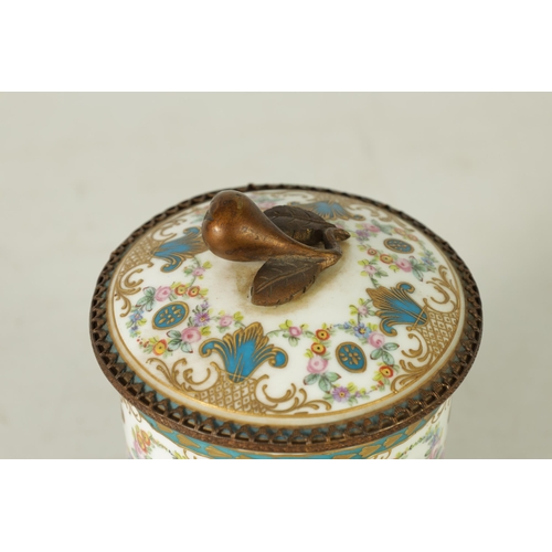 37 - AN 18TH CENTURY ORMOLU MOUNTED SERVES JAR AND COVER with shaped cut-out leafwork plinth and fruit fi... 