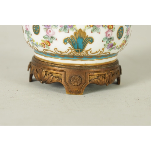 37 - AN 18TH CENTURY ORMOLU MOUNTED SERVES JAR AND COVER with shaped cut-out leafwork plinth and fruit fi... 