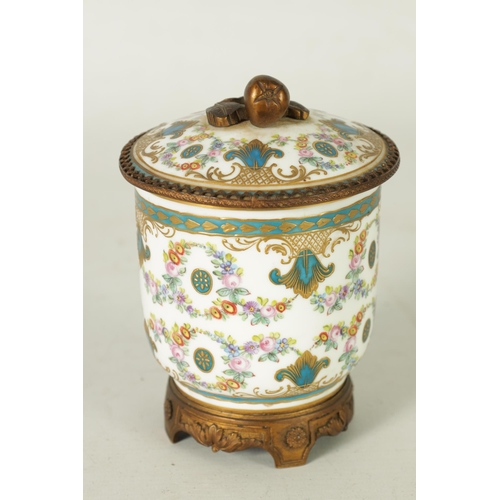 37 - AN 18TH CENTURY ORMOLU MOUNTED SERVES JAR AND COVER with shaped cut-out leafwork plinth and fruit fi... 